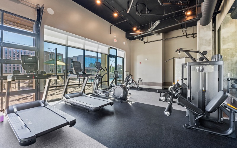 24-hour fitness center with cardio and resistance equipment